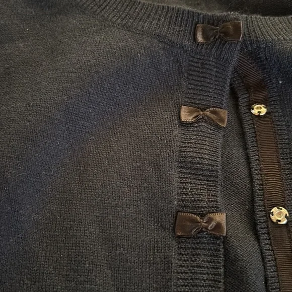 Navy blue merino wool Lord & Taylor cardigan sweater with black bow snap detail - Picture 2 of 3